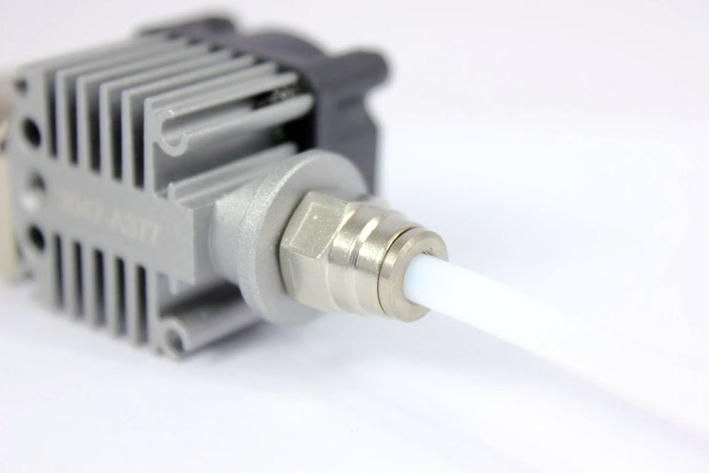 PTFE tube can be inserted through the connector and guides the filament as far as possible inside the hotend.
