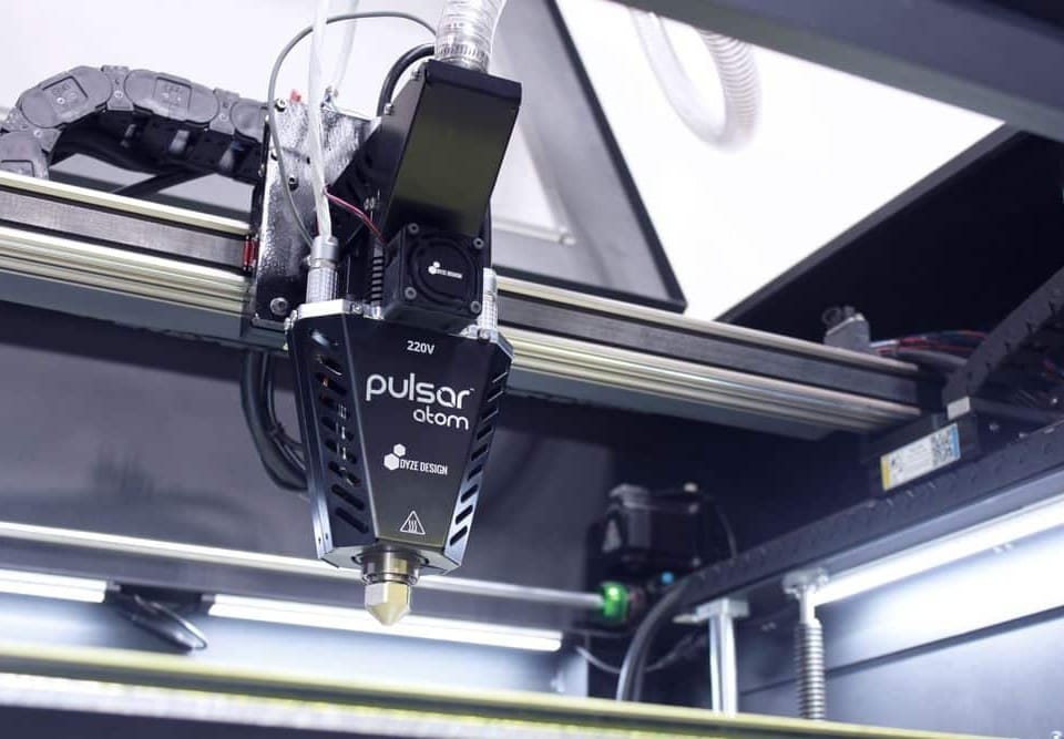 Pulsar Atom Pellet Extruder mounted on a gantry axis in a 3d printer.