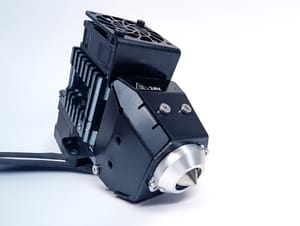 Side section view of the Zephyr™ High Flow Extruder, showcasing its compact design, advanced cooling system, patented MeltCore technology and precision components for high-performance 3D printing.